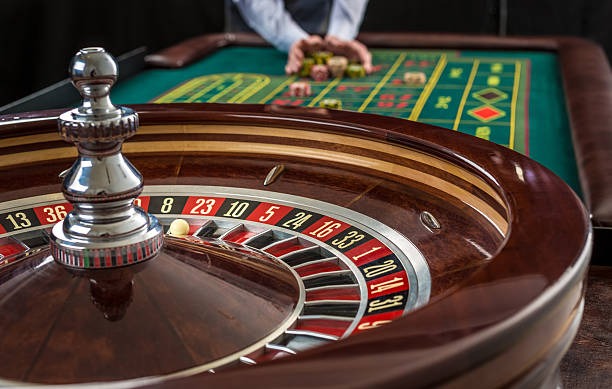 Caribbean Stud Poker table layout on jet4d login with dealer and player cards visible